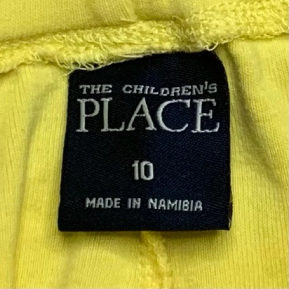 THE CHILDREN’S PLACE yellow tie front shorts.